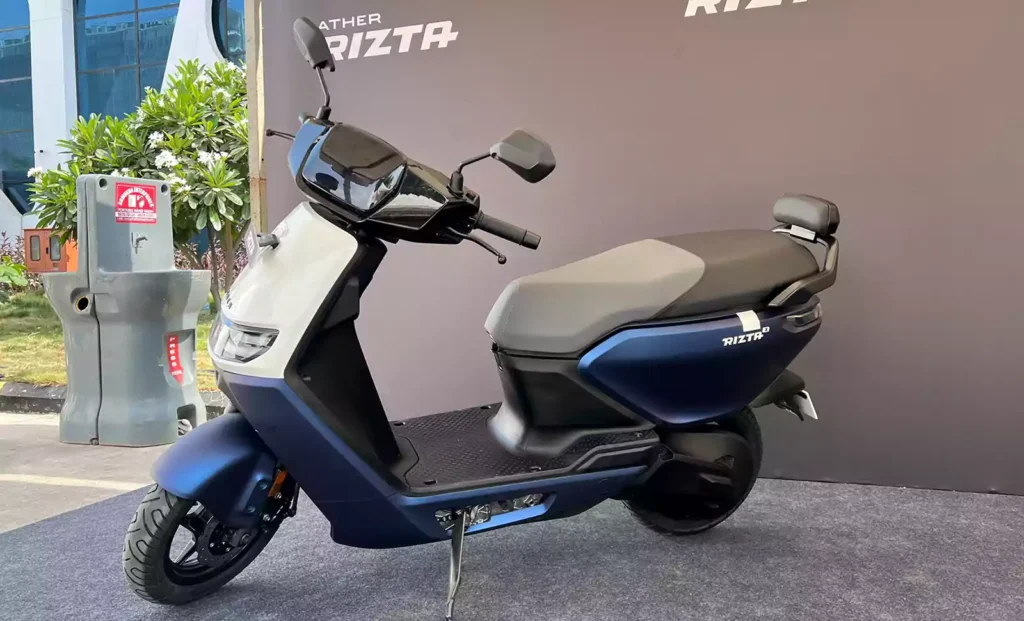 Ather Rizta electric scooter parked highlighting large seat and spacious under-seat storage ideal for Indian families
