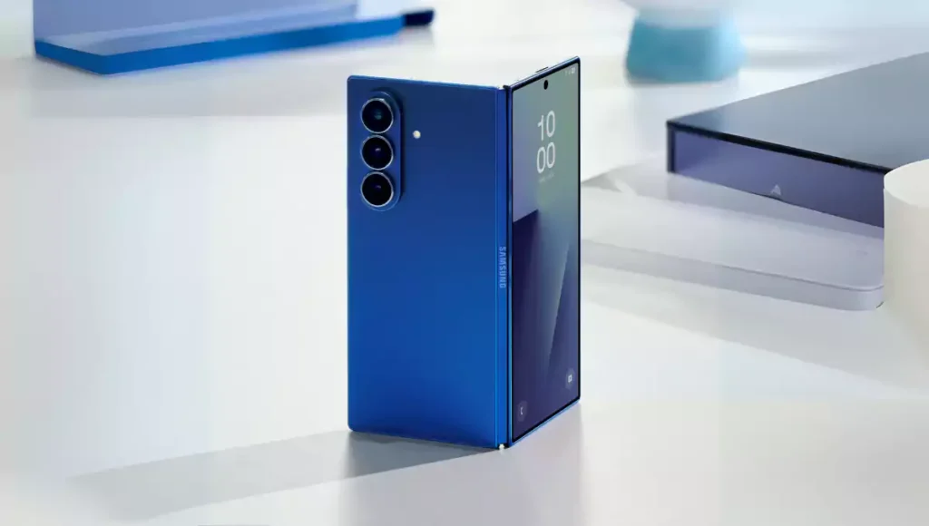 Samsung Galaxy Z Fold7 in blue with triple rear cameras and foldable design shown on a white desk.
